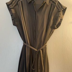 Dress by Express 100% Polyester women’s size medium.